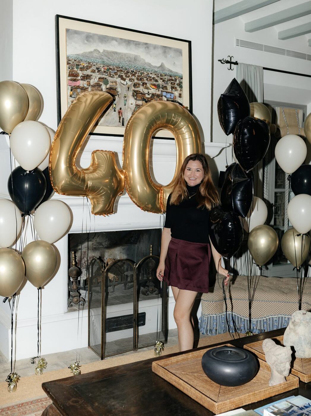 Gold and black helium balloon display for a 40th birthday, indoor party decoration Marbella