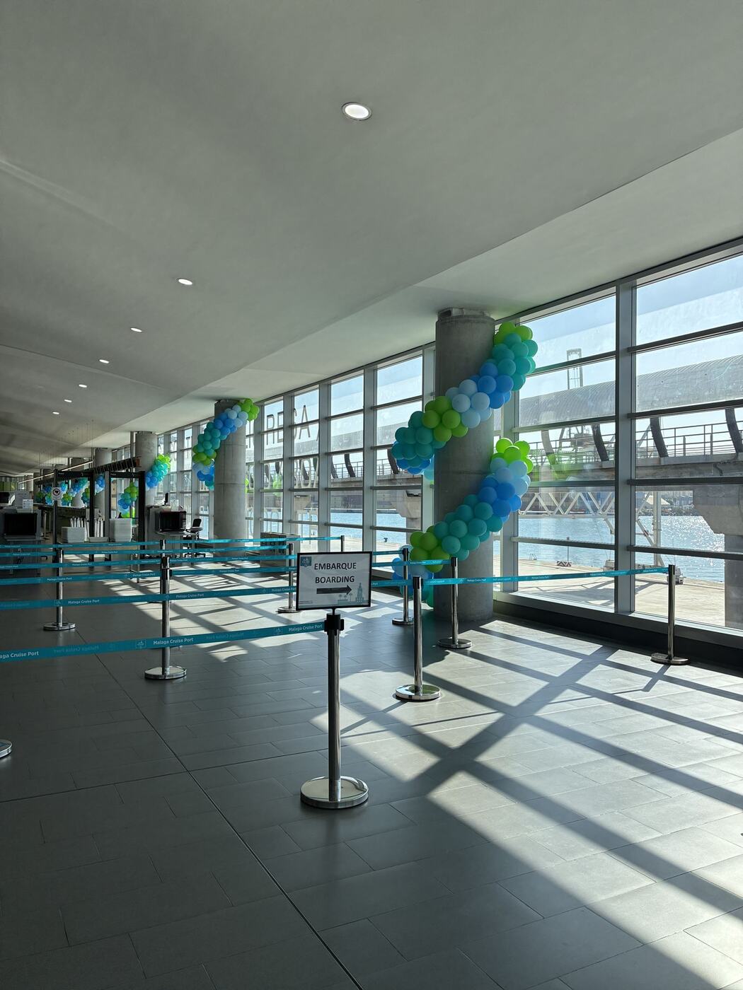 Balloon garland along the Malaga cruise terminal boarding walkway