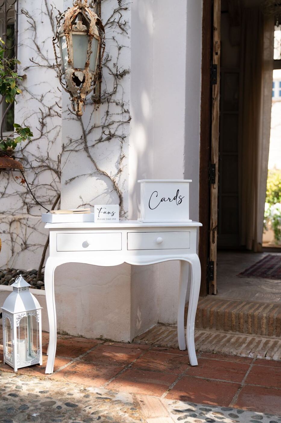 Wedding reception cards table with lanterns, Marbella